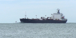 A cargo ship entering Tampa Bay near Egmont Key.
